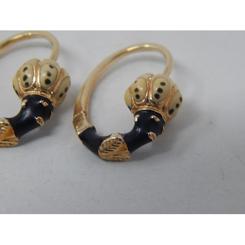 46 - 18ct Yellow Gold Vintage earrings with African woman theme.