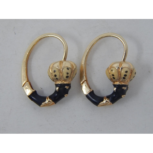 46 - 18ct Yellow Gold Vintage earrings with African woman theme.