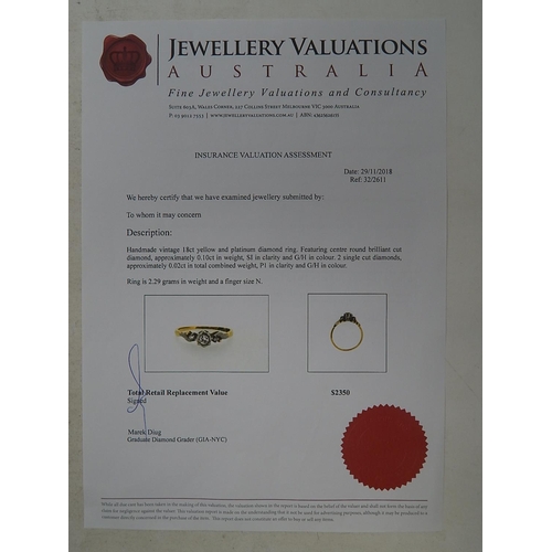49 - 18ct Yellow gold & platinum diamond ring. Centre round brilliant cut Diamond S1 clarity G/H colour w... 