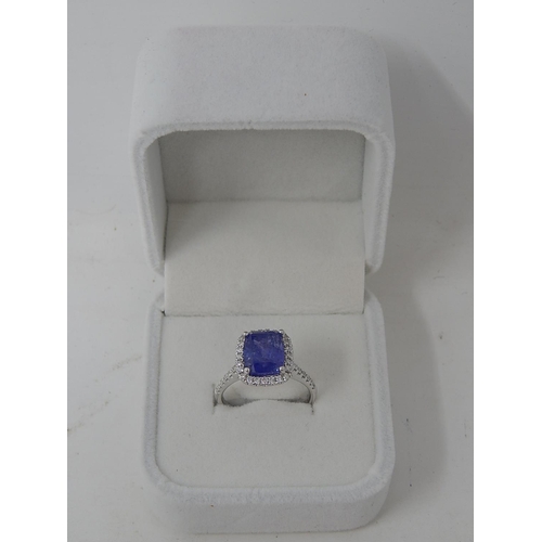 52 - 18ct White Gold Tanzanite & Diamond ring featuring centre cushion cut dark violet blue Tanzanite (4.... 