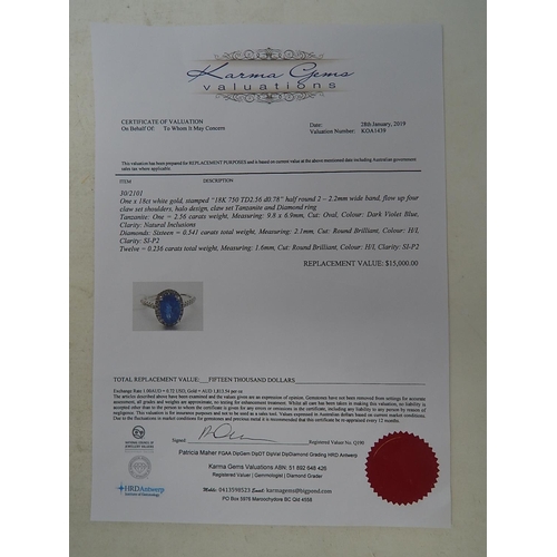 53 - 18ct White Gold tanzanite & diamond ring with centre oval cut pupleish blue Tanzanite (2.56ct)claw s... 