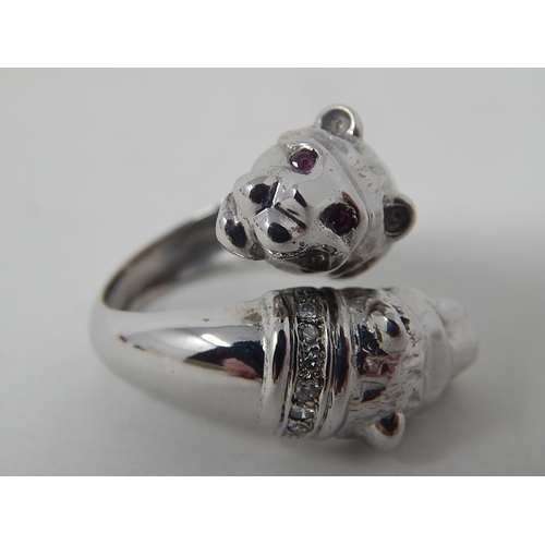 54 - 18ct White Gold Ring with Two Lion Heads with 12 round brilliant cut Diamonds grain set, colour H/J ... 