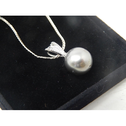 55 - Vintage White Gold Pearl & Diamond pendant featuring light silver black Tahitian Pearl, with 10 roun... 