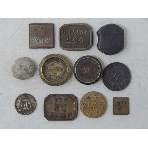 65 - 11 x early coin weights, misc items