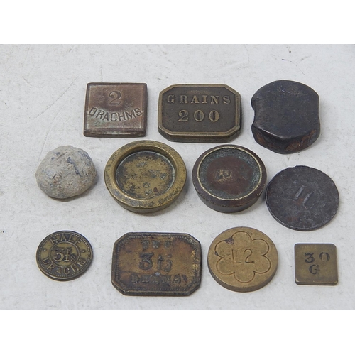 65 - 11 x early coin weights, misc items