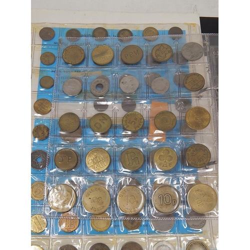 70 - Album containing large collection of coins and tokens