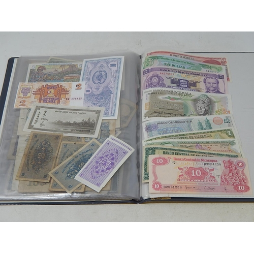 72 - An album of World Banknotes inc East Africa Currency Board King George VI Five Shillings