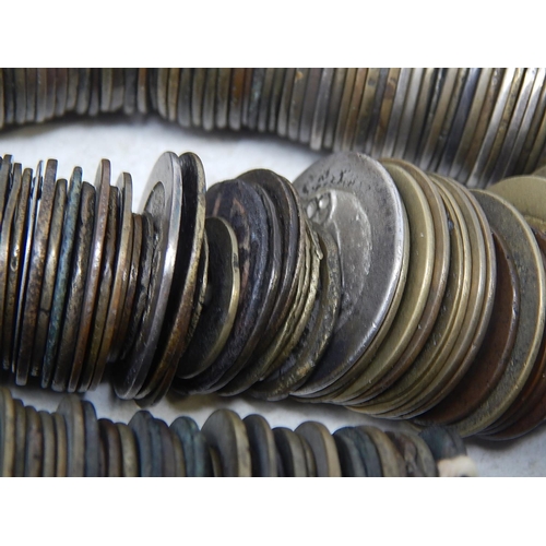 89 - Huge selection of Chinese coins all holed and strung, mainly base metal but some silver coloured not... 