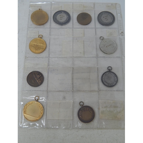 92 - Collection of 1947 and 1951 Athletic medallions (10)