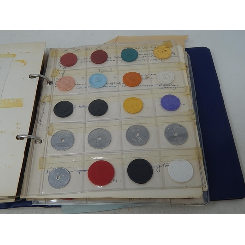 134 - Vintage coin album containing a substantial collection of World coins and tokens