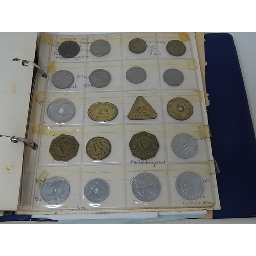 134 - Vintage coin album containing a substantial collection of World coins and tokens