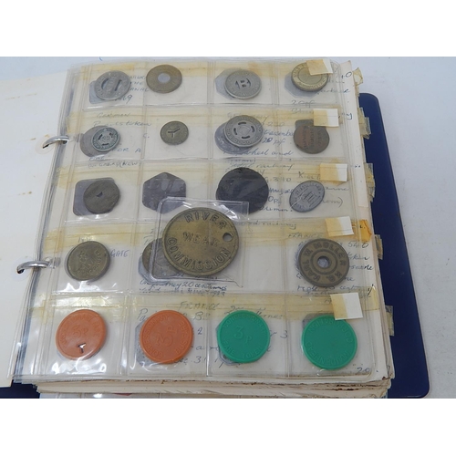 134 - Vintage coin album containing a substantial collection of World coins and tokens