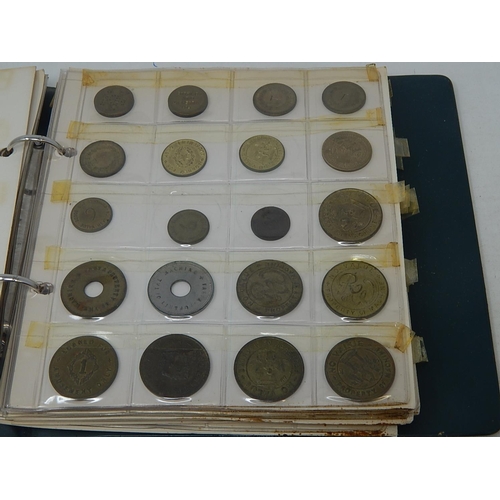 135 - Vintage coin album containing a very substantial collection of World coins