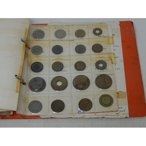 136 - Substantial collection of Amusement Tokens housed in vintage album well written up