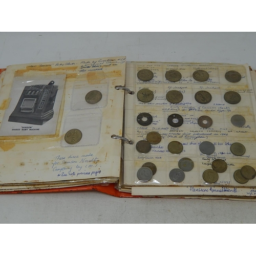 136 - Substantial collection of Amusement Tokens housed in vintage album well written up