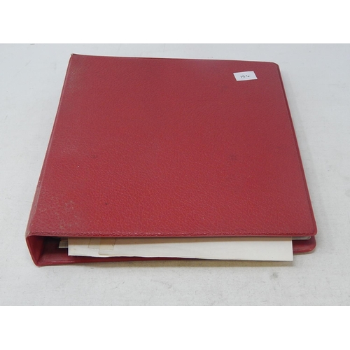 154 - Red vintage coin album containing a collection of tokens, etc