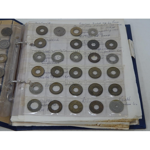 168 - Very substantial collection of USA amusement machine tokens housed in vintage album