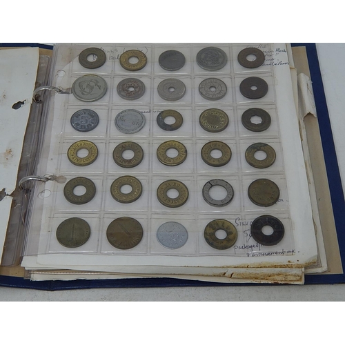 168 - Very substantial collection of USA amusement machine tokens housed in vintage album