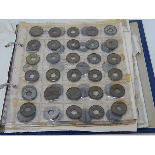 168 - Very substantial collection of USA amusement machine tokens housed in vintage album