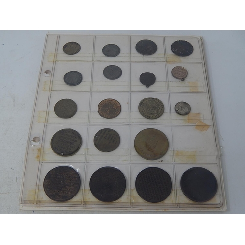 176 - Good selection of vintage tokens on 6 album pages, many identified