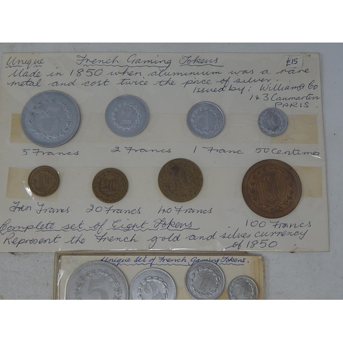 199 - 2 sets of early French Gaming tokens