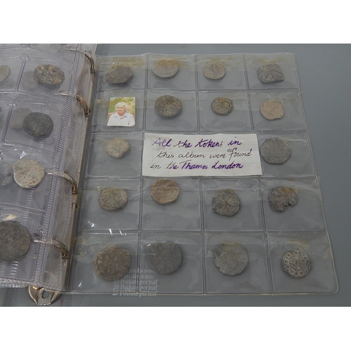 215 - Album of tokens all found in the Thames