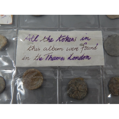 215 - Album of tokens all found in the Thames