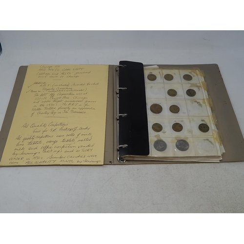 267 - album containing a collection of tokens, jettons, etc