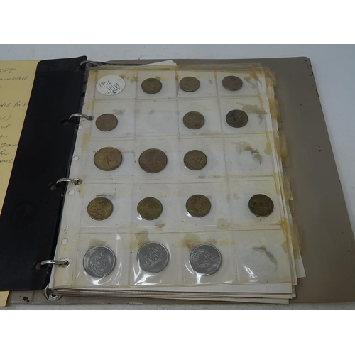 267 - album containing a collection of tokens, jettons, etc