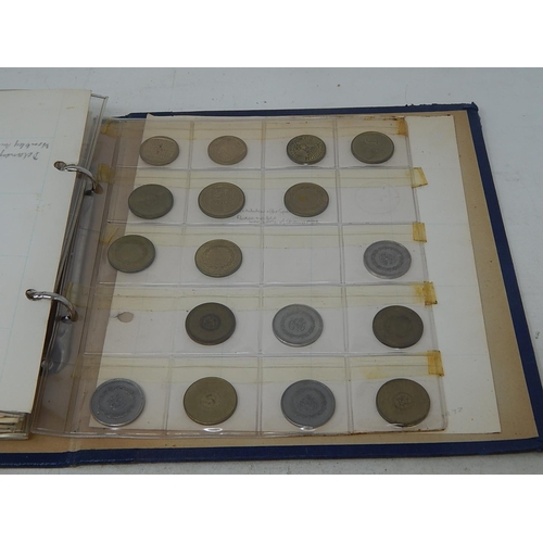 270 - vintage album containing large selection of tokens, jettons