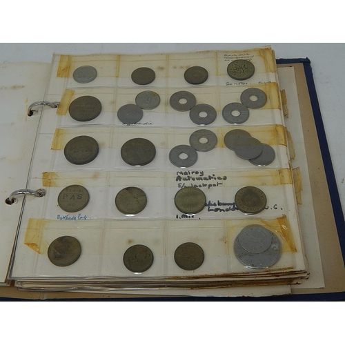 270 - vintage album containing large selection of tokens, jettons