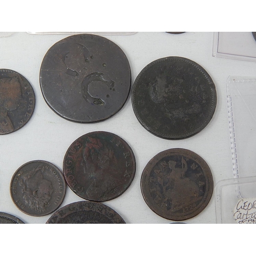 442 - A large collection of early George III Coinage; includes 1749 Copper Farthing; 1717 and 1718 Copper ... 