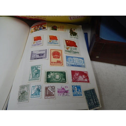 477 - A box containing a collection of coins and tokens, some stamps in albums and some vintage coin magaz... 