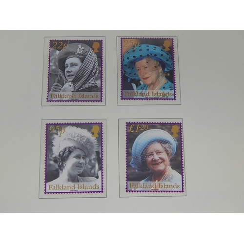 266 - The Queen Mother 1900-2002 de-luxe stamp and colour illustrated cover collection housed in black alb... 