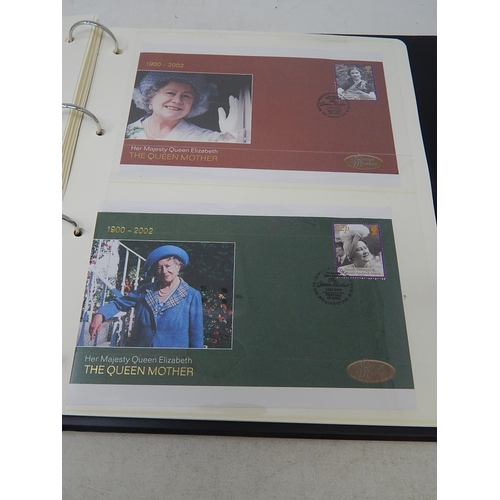 266 - The Queen Mother 1900-2002 de-luxe stamp and colour illustrated cover collection housed in black alb... 