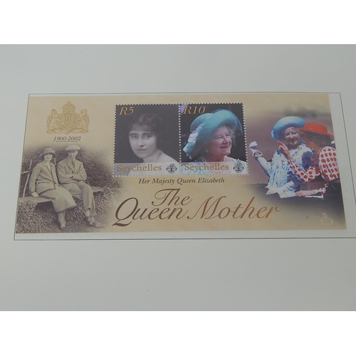 266 - The Queen Mother 1900-2002 de-luxe stamp and colour illustrated cover collection housed in black alb... 