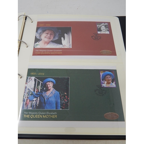 266 - The Queen Mother 1900-2002 de-luxe stamp and colour illustrated cover collection housed in black alb... 