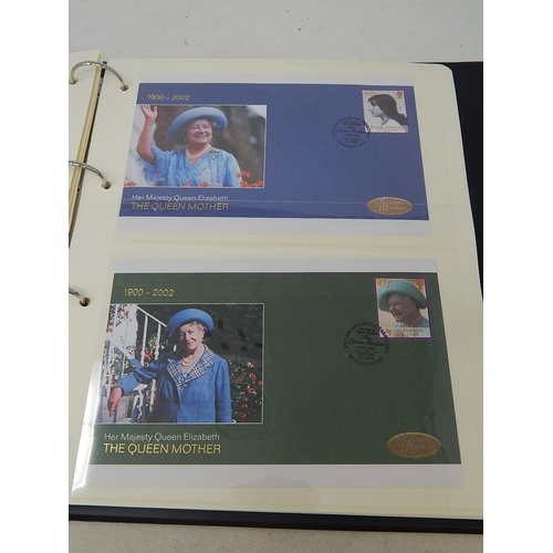 266 - The Queen Mother 1900-2002 de-luxe stamp and colour illustrated cover collection housed in black alb... 