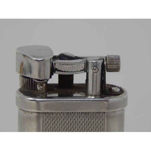60 - Dunhill Silver Plated Desk Lighter. Measures 15cm high: From a Private Collection.