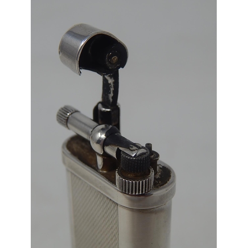 60 - Dunhill Silver Plated Desk Lighter. Measures 15cm high: From a Private Collection.