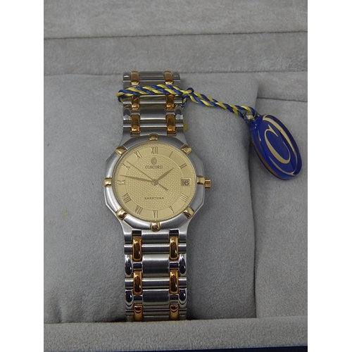 76 - Gentleman's CONCORD SARATOGA 18ct Gold & Stainless Steel Wristwatch with Date Aperture. The Watch is... 