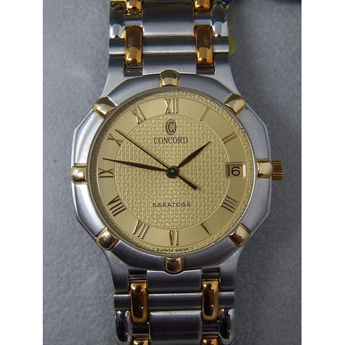 76 - Gentleman's CONCORD SARATOGA 18ct Gold & Stainless Steel Wristwatch with Date Aperture. The Watch is... 