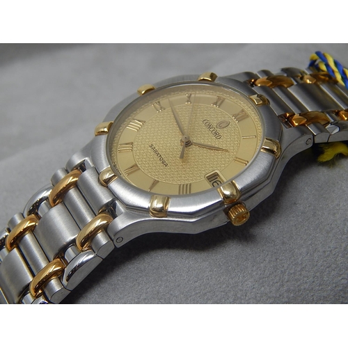 76 - Gentleman's CONCORD SARATOGA 18ct Gold & Stainless Steel Wristwatch with Date Aperture. The Watch is... 