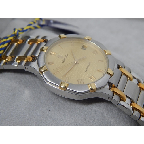 76 - Gentleman's CONCORD SARATOGA 18ct Gold & Stainless Steel Wristwatch with Date Aperture. The Watch is... 
