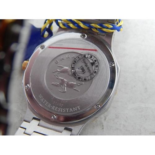 76 - Gentleman's CONCORD SARATOGA 18ct Gold & Stainless Steel Wristwatch with Date Aperture. The Watch is... 