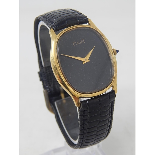 77 - Piaget: Gentleman's Wristwatch on Leather Strap. 18ct Gold E/P.