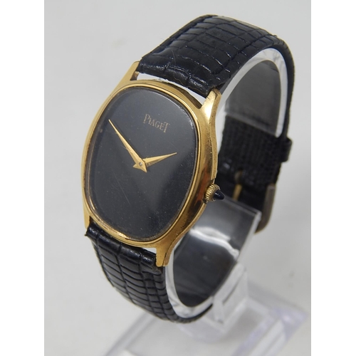 77 - Piaget: Gentleman's Wristwatch on Leather Strap. 18ct Gold E/P.