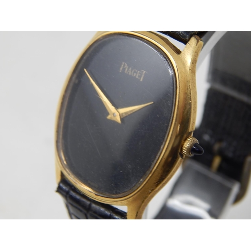 77 - Piaget: Gentleman's Wristwatch on Leather Strap. 18ct Gold E/P.