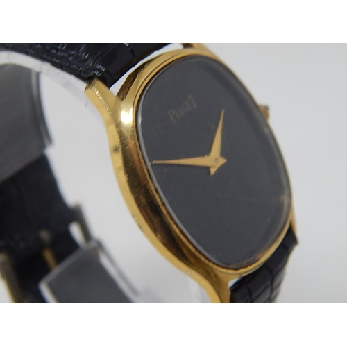 77 - Piaget: Gentleman's Wristwatch on Leather Strap. 18ct Gold E/P.