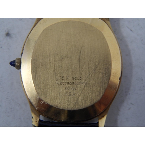 77 - Piaget: Gentleman's Wristwatch on Leather Strap. 18ct Gold E/P.